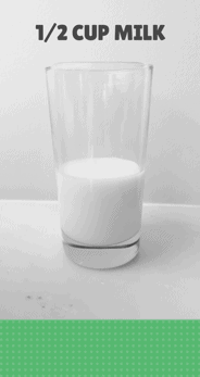 1/2 cup milk in clear glass