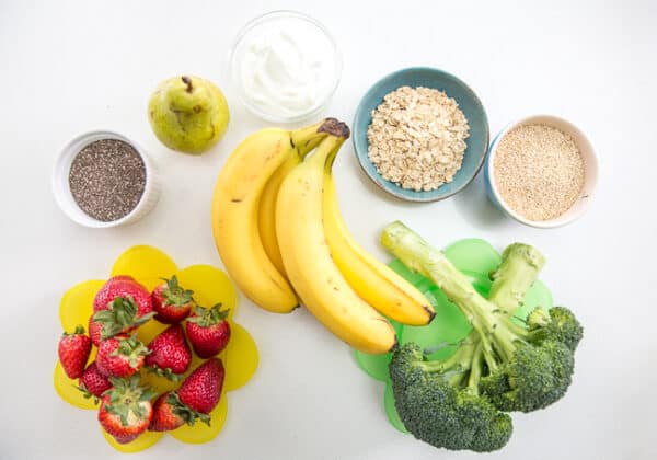 top down view of fruits and vegetables with whole grains, healthy fats and high protein dairy