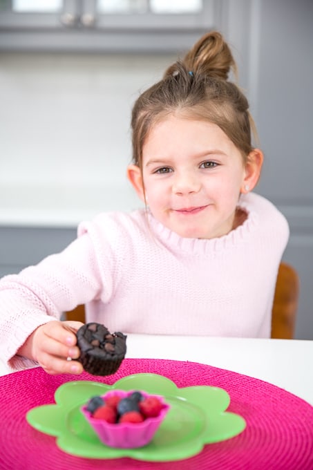 child eating flourless lentil protein muffins