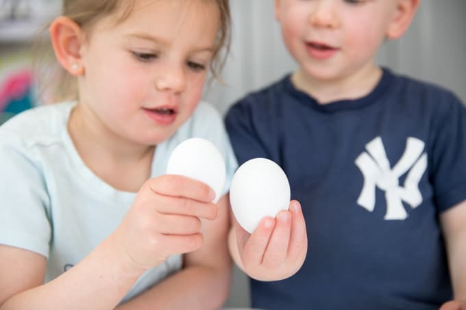 protein for kids - kids holding up eggs