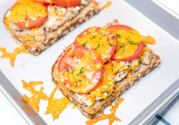 tuna melts on whole grain bread with tomatoes and melted cheese