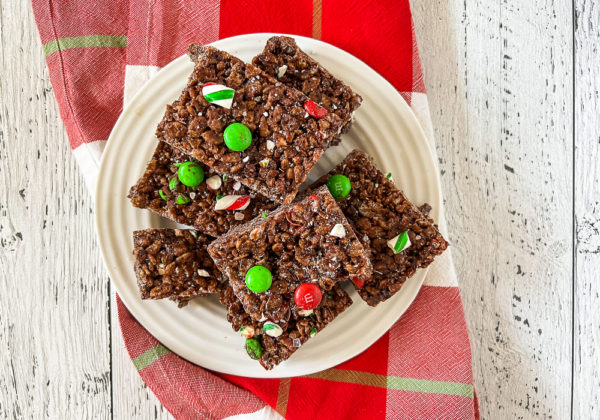 rice krispie treats on a plate with M&M candies