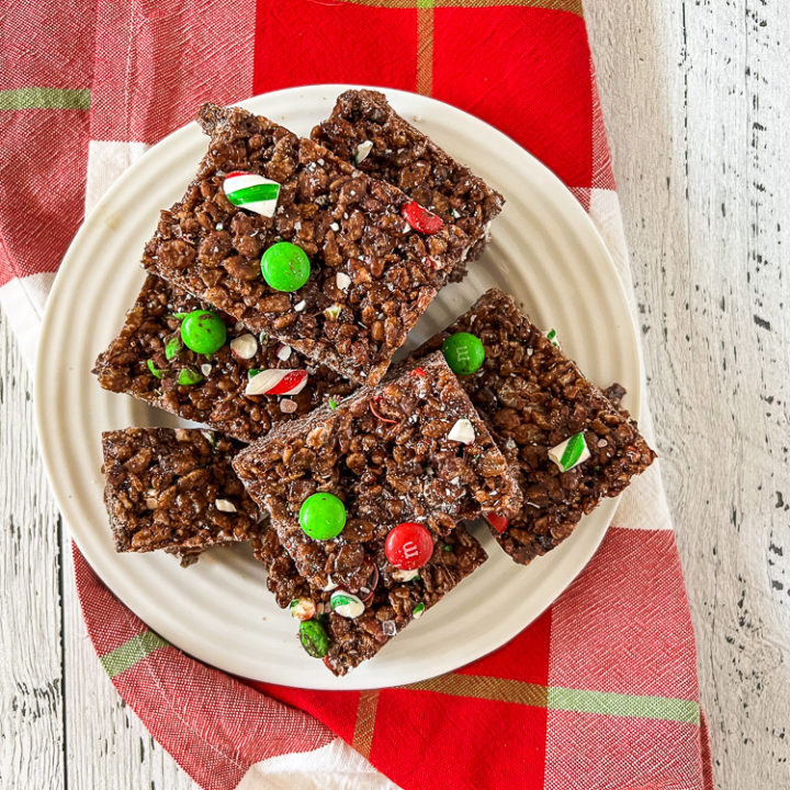 rice krispie treats on a plate with M&M candies