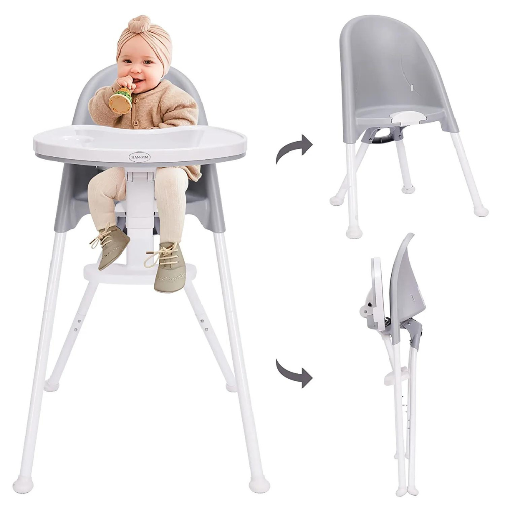 a baby sitting in a highchair