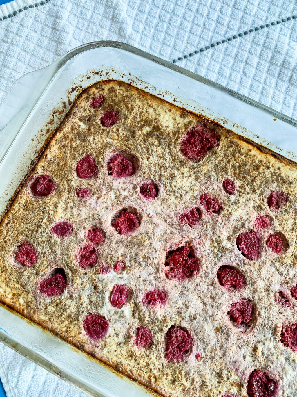 top down view of baked banana raspberry quinoa dish for baby-led weaning