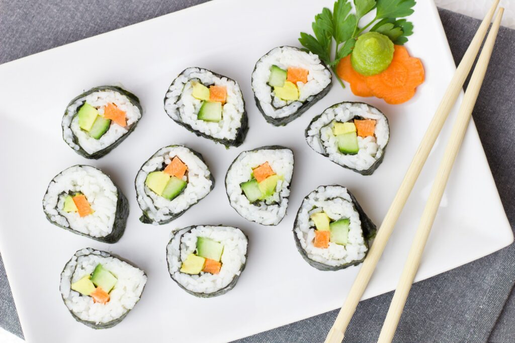 top down view of sushi pieces on a plate