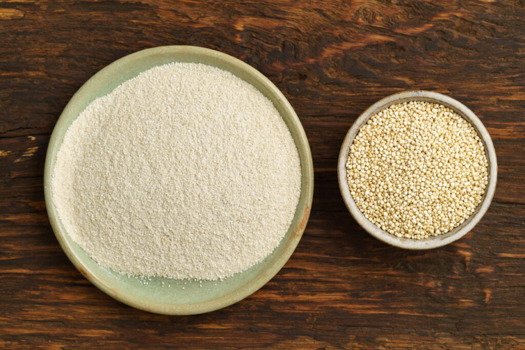 Quinoa and quinoa flour in small bowls