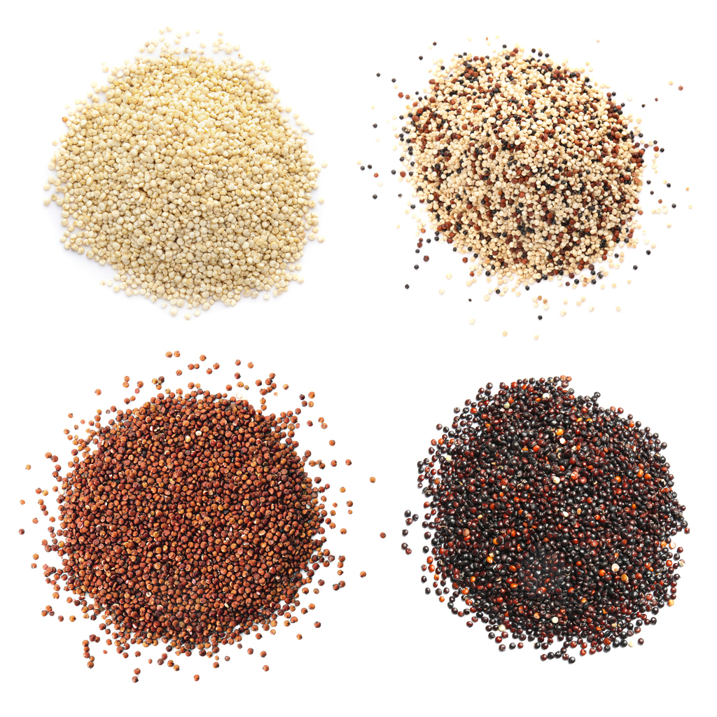 Set with different types of quinoa on white background, top view