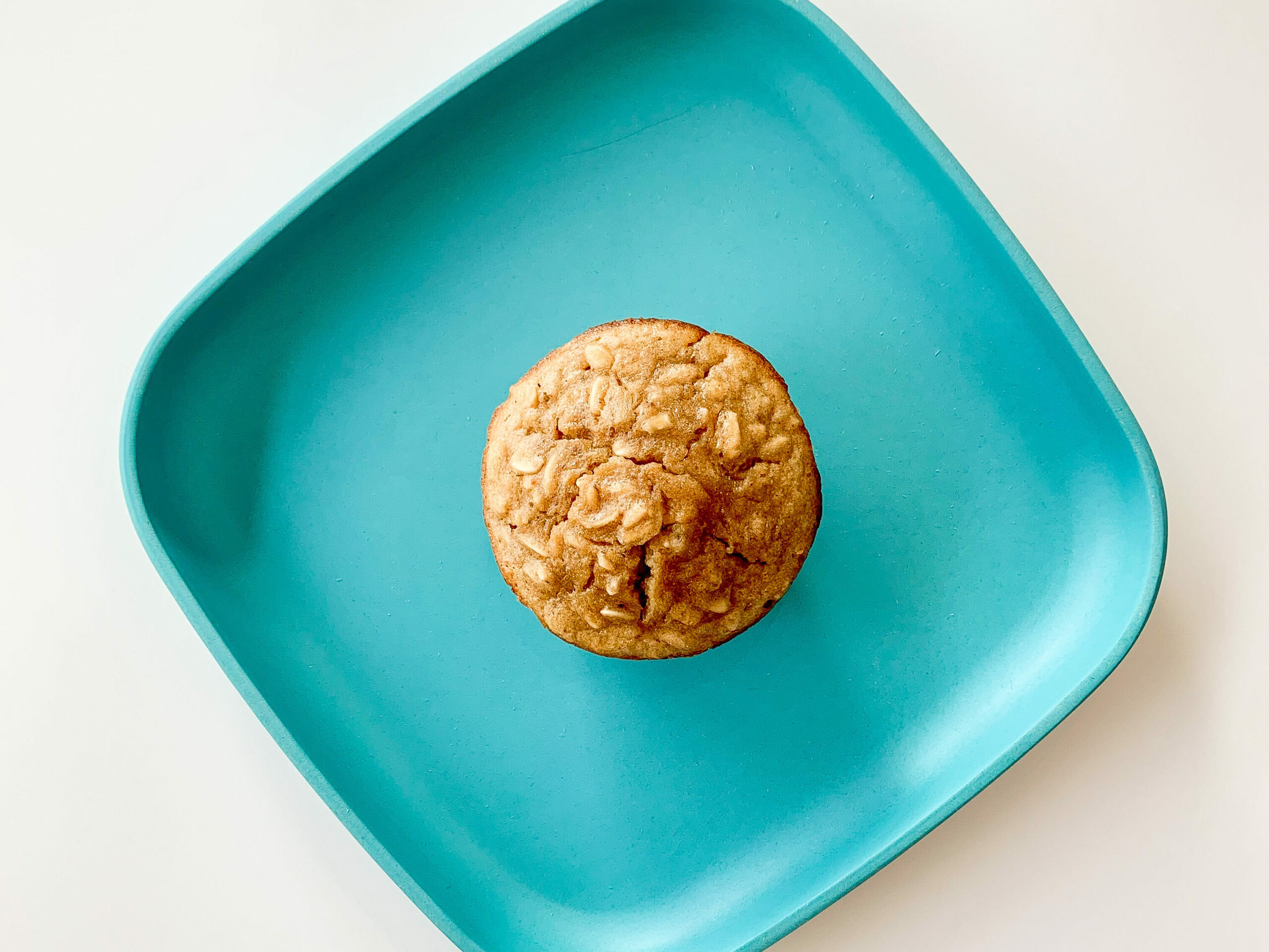 top down view of oatmeal muffin on a plate
