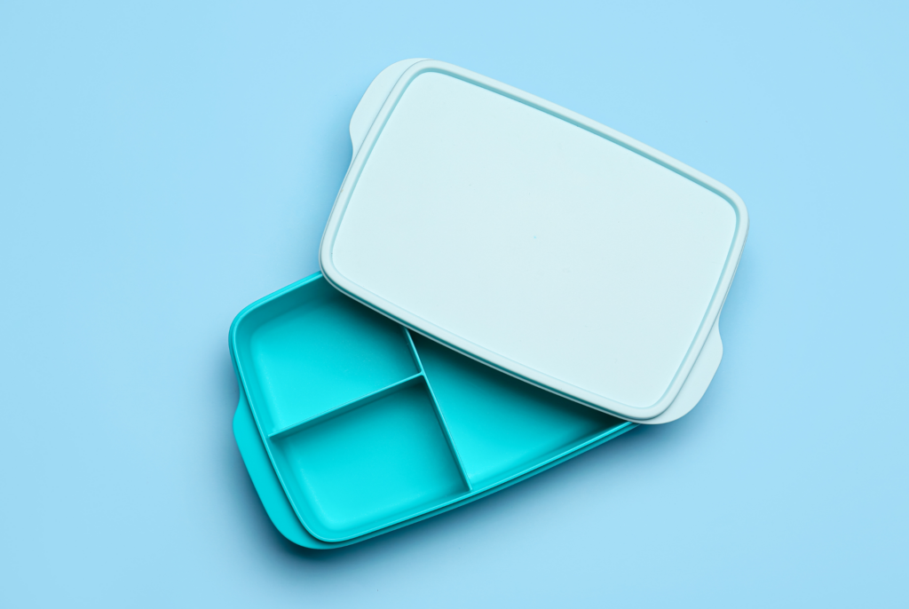 top down view of an empty blue lunchbox for kids