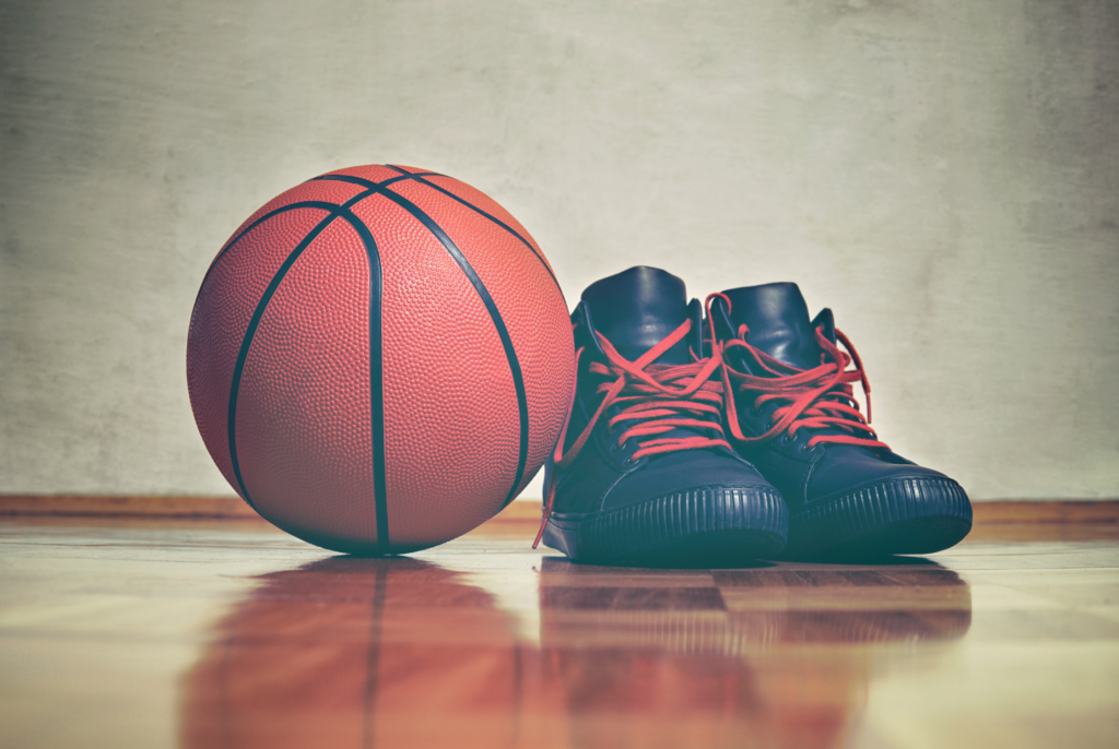 close up of a basketball with shoes