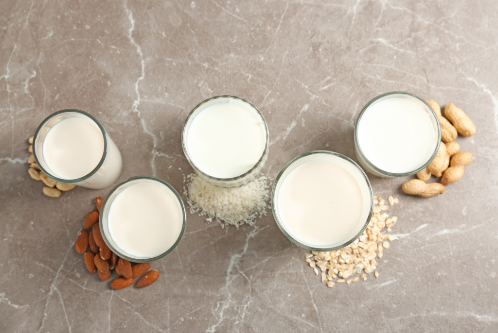top down view of plant-based milks in cups