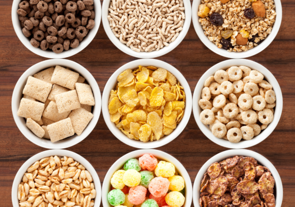 top down view of a variety of breakfast cereals in small bowls
