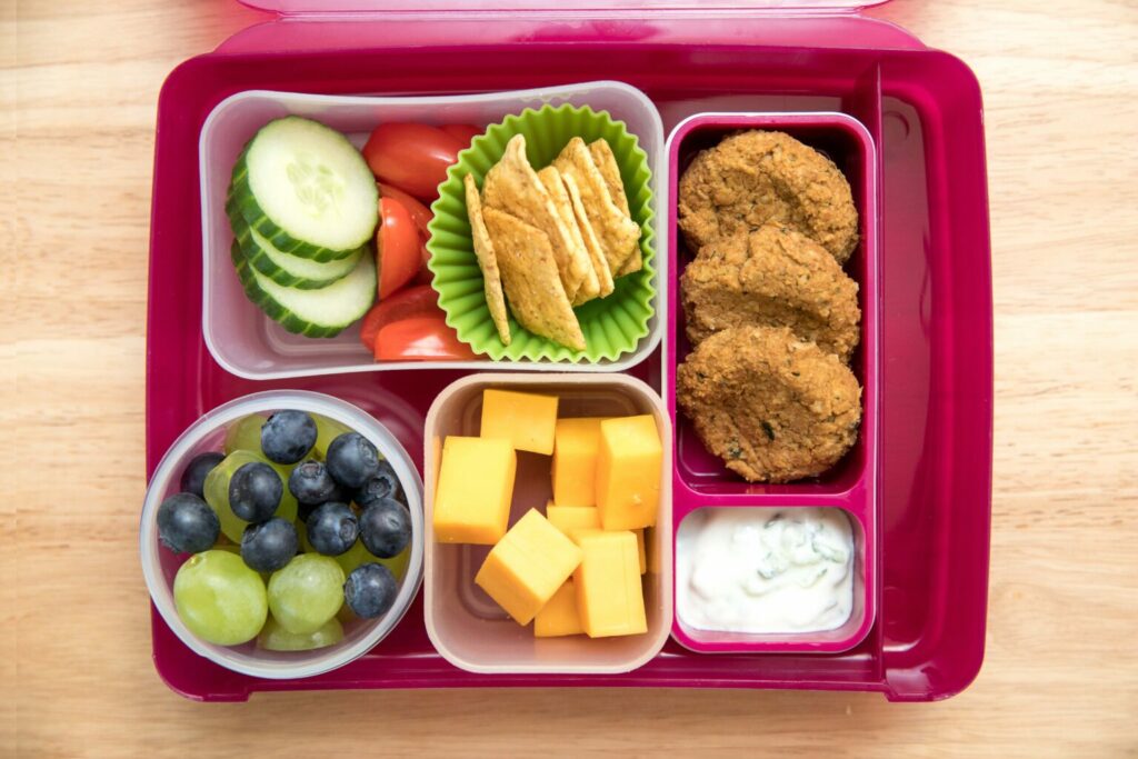 top down view of lentil nuggets in a lunch box