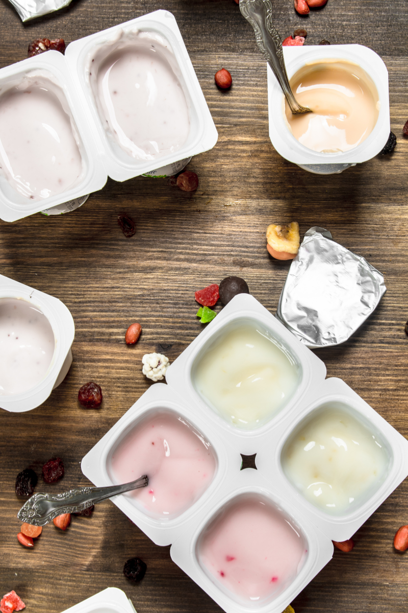 top down view of flavored yogurts in containers